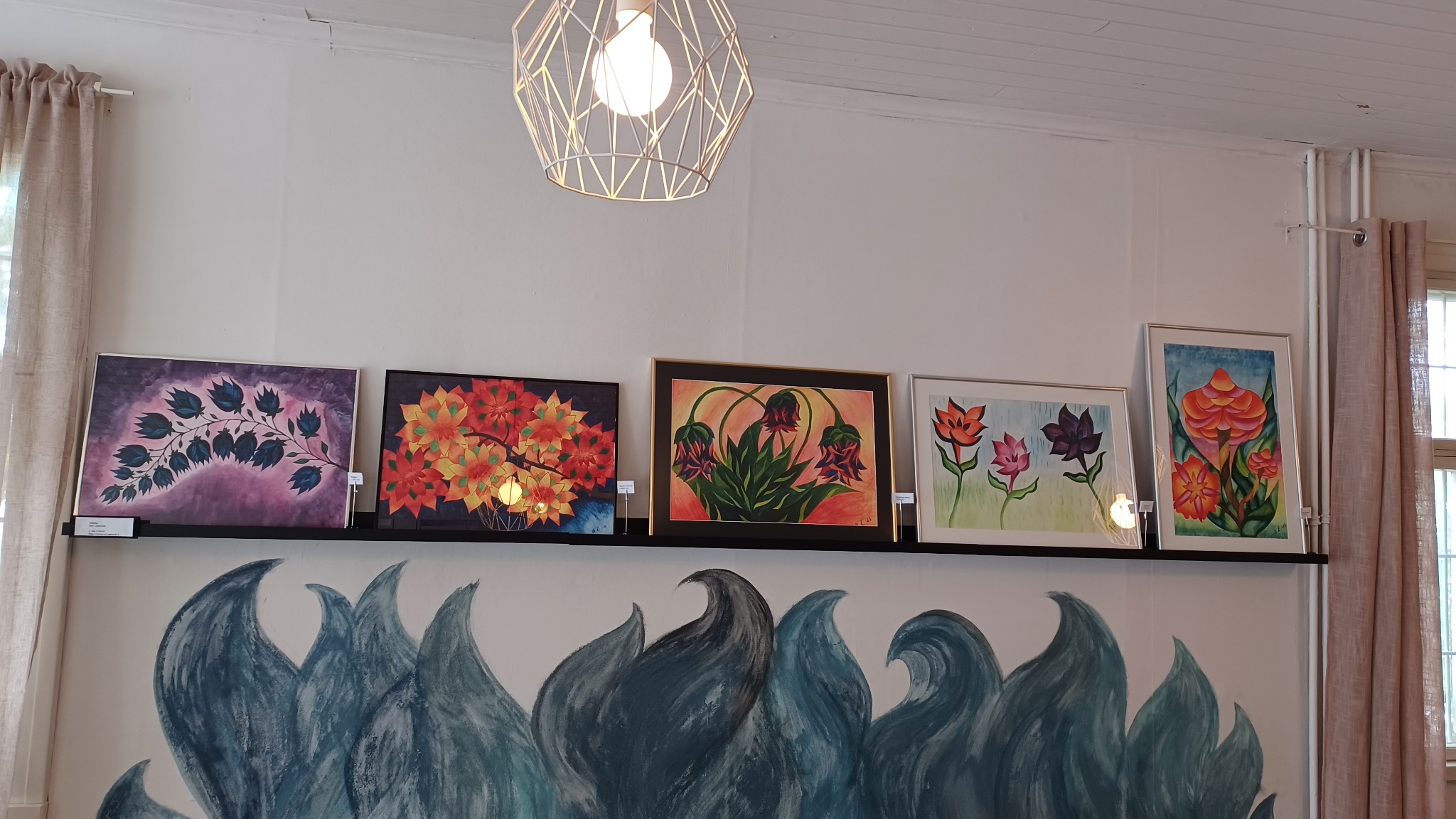 Marza's Art paintings displayed at Sininen Kettu Café
